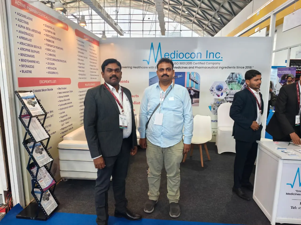 Mediocon Inc award handshake moment at the pharma expo in Hyderabad